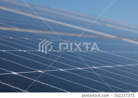 Solar panel cells in focus - innovative energy. Copy space for banner. 102237372