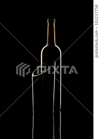Still life with glass objects on a black background Still life with glass objects on a black background 102237756
