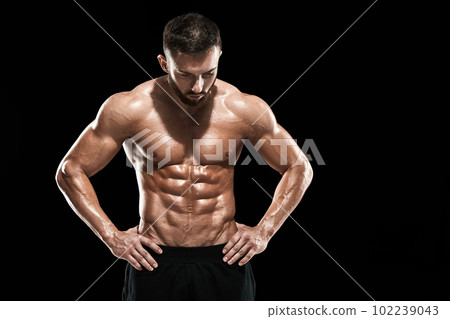 Muscular bodybuilder guy doing posing 102239043