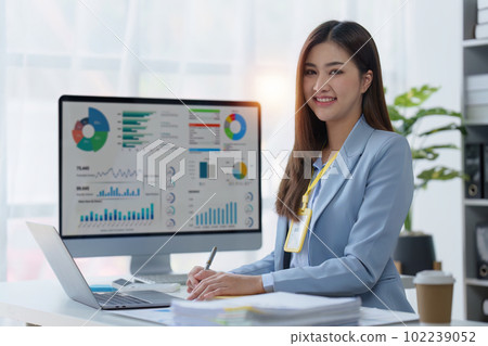 Accountant woman working on laptop and do document, tax, exchange, research, accounting and Financial advisor concept Accountant woman working on laptop and do document, tax, exchange, research, accounting and Financial advisor concept 102239052