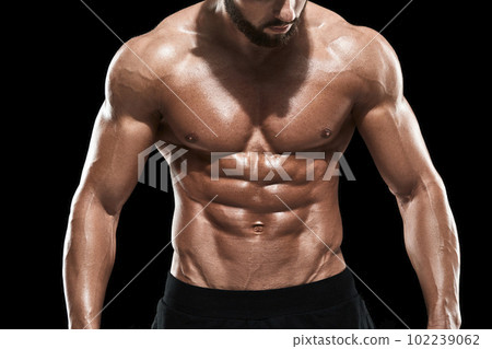 Muscular bodybuilder guy doing posing Muscular bodybuilder guy doing posing 102239062