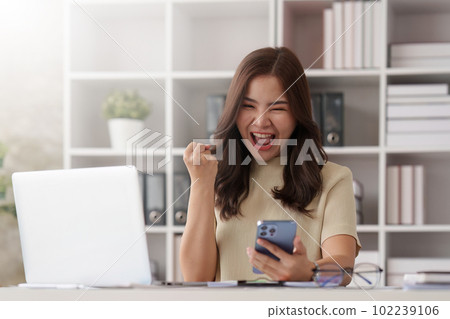 Financial advisor, corporate Accountant woman in office. analyzing benefits, enjoying financial success, job high result Financial advisor, corporate Accountant woman in office. analyzing benefits, enjoying financial success, job high result 102239106
