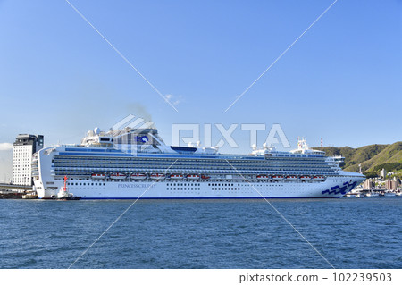 Photographing the scenery of the cruise ship Diamond Princess, which is docking at Hakodate Port in Hakodate City, Hokkaido in spring. Photographing the scenery of the cruise ship Diamond Princess, which is docking at Hakodate Port in Hakodate City, Hokkaido in spring. 102239503