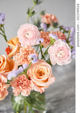 Finished flower arrangement in a vase for home. Flowers bunch, set for interior. Fresh cut flowers for decoration home. European floral shop. Delivery fresh cut flower. Finished flower arrangement in a vase for home. Flowers bunch, set for interior. Fresh cut flowers for decoration home. European floral shop. Delivery fresh cut flower. 102240028