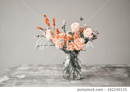 Finished flower arrangement in a vase for home. Flowers bunch, set for interior. Fresh cut flowers for decoration home. European floral shop. Delivery fresh cut flower. Finished flower arrangement in a vase for home. Flowers bunch, set for interior. Fresh cut flowers for decoration home. European floral shop. Delivery fresh cut flower. 102240135