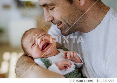 Close-up of father holding his little son. 102240992