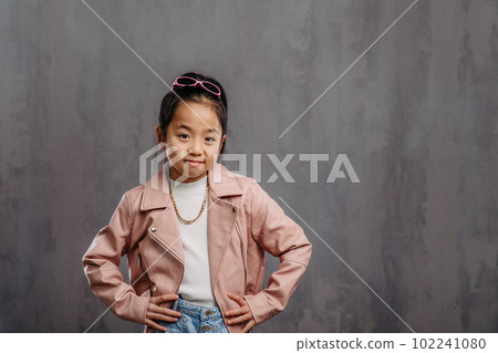 Portrait of little japanesse girl with leather jacket. Portrait of little japanesse girl with leather jacket. 102241080