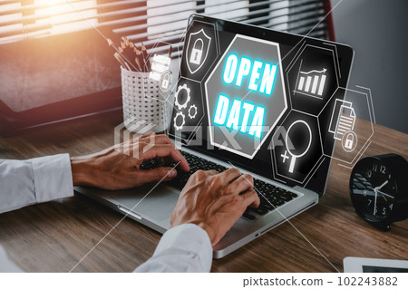 Open data concept, Business person hand working on laptop computer with open data icon on virtual screen. Open data concept, Business person hand working on laptop computer with open data icon on virtual screen. 102243882