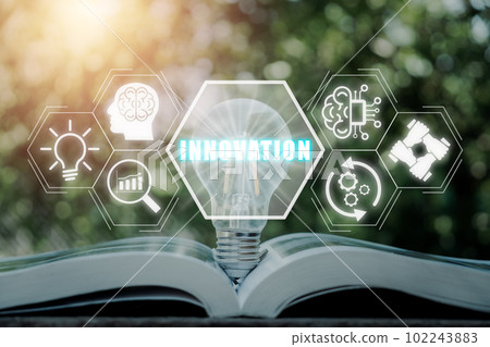 Innovation concept, Light bulb on book with innovation icon on virtual screen. Innovation concept, Light bulb on book with innovation icon on virtual screen. 102243883