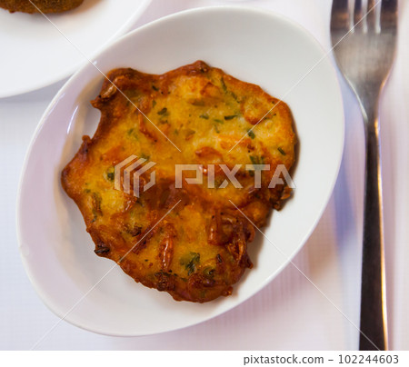 Spanish tortilla with shrimp closeup 102244603