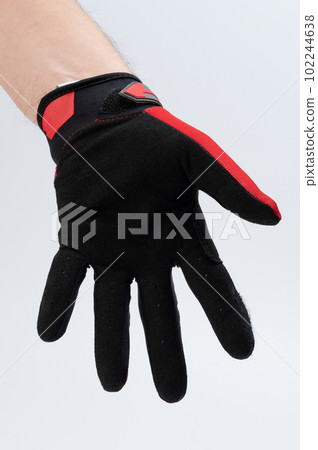Man hand in mechanic glove Man hand in mechanic glove 102244638
