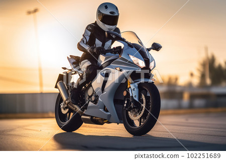 Woman driving a cool motorcycle 102251689