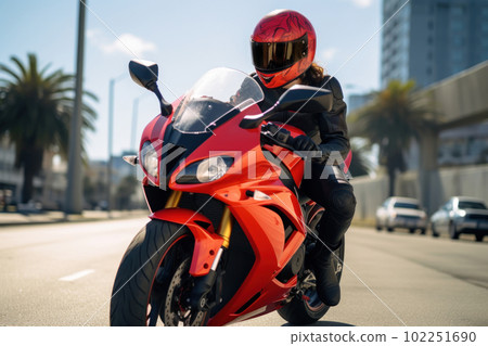 Woman driving a cool motorcycle 102251690