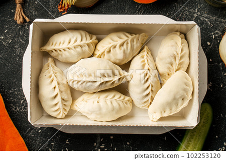 Portion of semi finished oriental manti dumplings 102253120