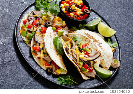 Beef Steak Tacos with veggies, avocado, corn 102254020