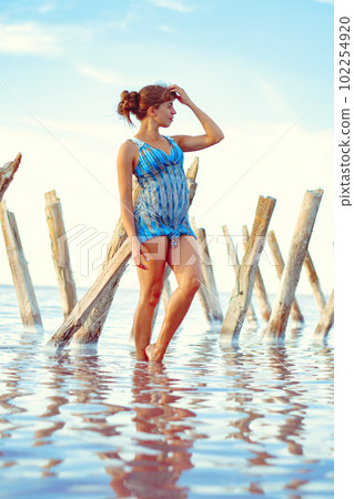 a girl in a swimsuit on a salt lake 102254920