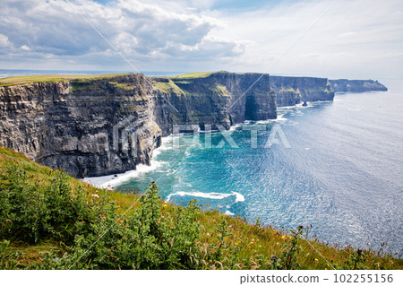 Spectacular Cliffs of Moher are sea cliffs located at the southwestern edge of the Burren region in County Clare, Ireland. Wild Atlantic way 102255156