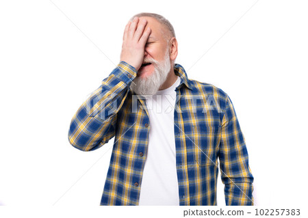 portrait of a handsome 60s middle-aged gray-haired man with a beard in a shirt covering his face portrait of a handsome 60s middle-aged gray-haired man with a beard in a shirt covering his face 102257383