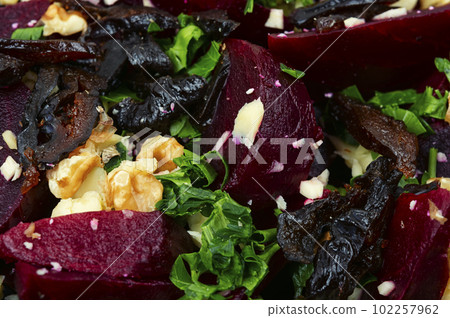 Vegetable salad with beets and nuts. Vegetable salad with beets and nuts. 102257962