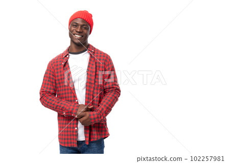 handsome smart black man in casual plaid shirt posing on white background with copy space handsome smart black man in casual plaid shirt posing on white background with copy space 102257981