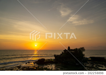 The silhouette of the mystical Tanah Lot temple on the sea The silhouette of the mystical Tanah Lot temple on the sea 102258898