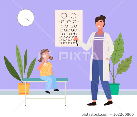 The optometrist checks eyesight of a little girl. The patient looks at the table for a vision test 102260800