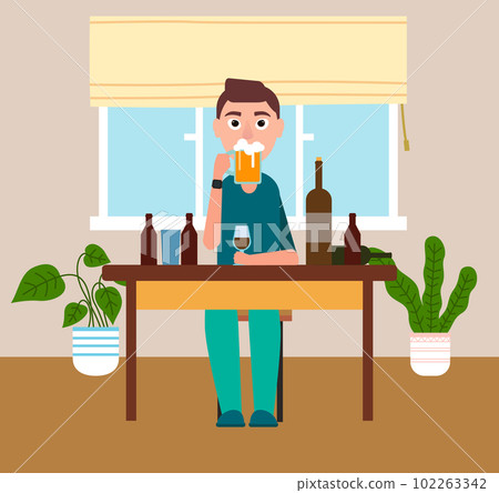 I stay at home. Man at the table is drinking beer. Guy is drinking alcohol. Self isolation mode 102263342