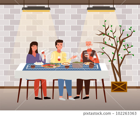 The family dines with food in Georgien-style restaurant. Relatives eat traditional dishes in cafe 102263363