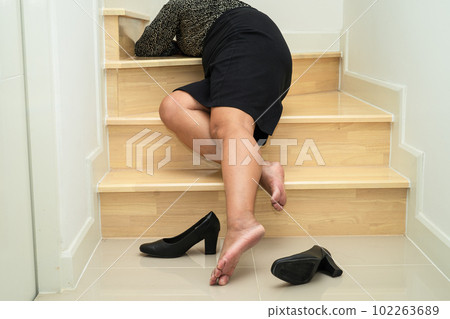 Asian lady woman patient fall down the stairs because slippery surfaces Asian lady woman patient fall down the stairs because slippery surfaces 102263689