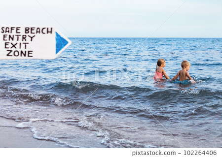 Happy family have fun on tropical sea beach resort 102264406