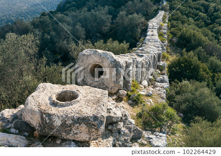 Ruins of old Roman Delikkemer aqueduct bridge at Lycian way 102264429