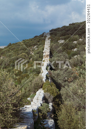 Ruins of old Roman Delikkemer aqueduct bridge at Lycian way Ruins of old Roman Delikkemer aqueduct bridge at Lycian way 102264431