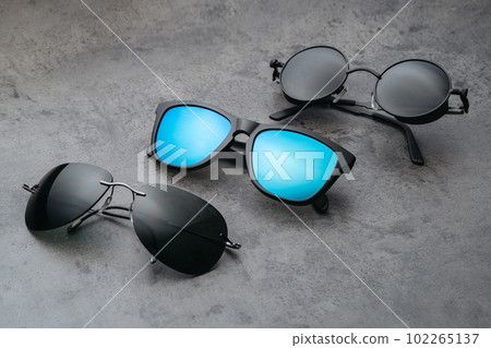 Different assortment of sunglasses in optical store Different assortment of sunglasses in optical store 102265137