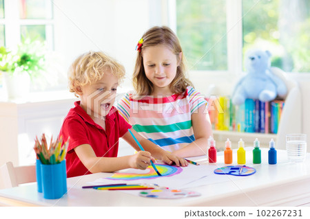 Kids paint. Child painting. Little boy drawing. 102267231