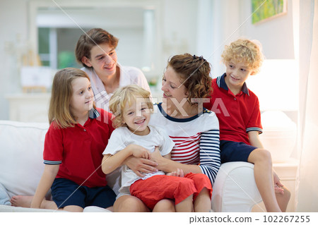 Family at home. Mother and children. Mom and kids. 102267255