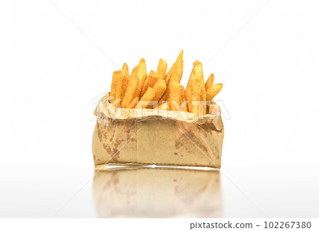 French fries in paper bag isolated on white background with clipping path. 102267380