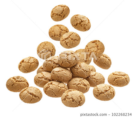 Falling italian amaretti, almond cookies isolated Falling italian amaretti, almond cookies isolated 102268234