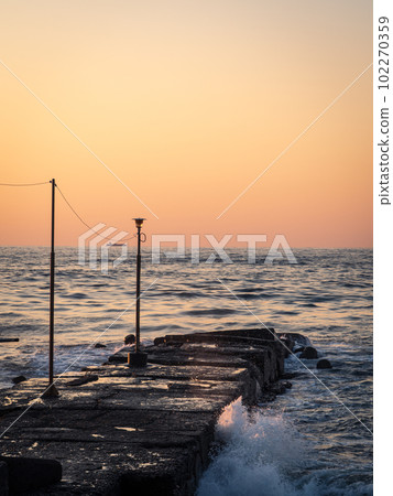 Seaside Jetty and Street Light 102270359