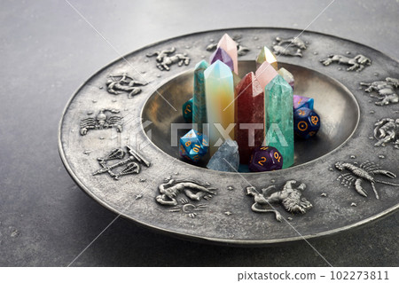 Crystals for healing, fortune telling and astrologhy circle on grey background. Esoteric and life coaching concept. 102273811