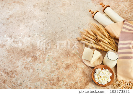 Kosher dairy product for celebration Jewish Holiday Shavuot. Shavuot background. 102273821