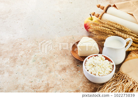 Kosher dairy product for celebration Jewish Holiday Shavuot. Shavuot background. 102273839