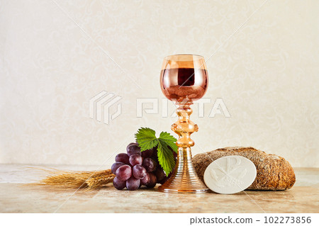 Communion Still life with chalice of wine and bread 102273856