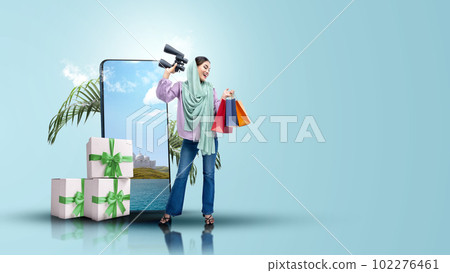 Asian Muslim woman in a headscarf holding a binocular and shopping bags Asian Muslim woman in a headscarf holding a binocular and shopping bags 102276461