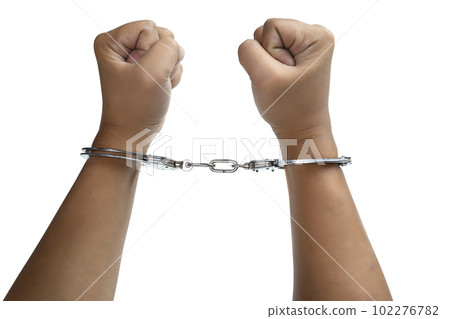 Arrested man with a handcuff on his hand 102276782