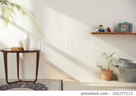 Vases and objects on the table in a warm room with sunlight coming in Vases and objects on the table in a warm room with sunlight coming in 102277221