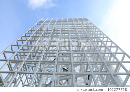 White Steel beam construction with blue sky background White Steel beam construction with blue sky background 102277758