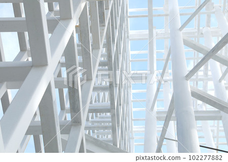 White Steel beam construction with blue sky background White Steel beam construction with blue sky background 102277882