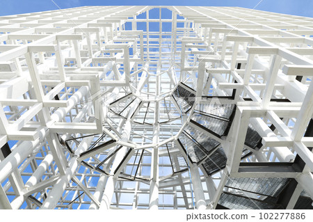 White steel stairway to the top of the tower under construction White steel stairway to the top of the tower under construction 102277886