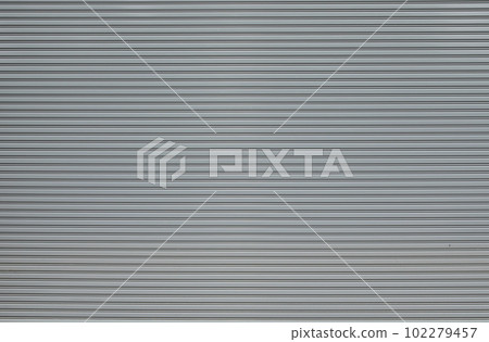 Gray metalic shutter background. Roller shutter door texture background Gray metalic shutter background. Roller shutter door texture background 102279457