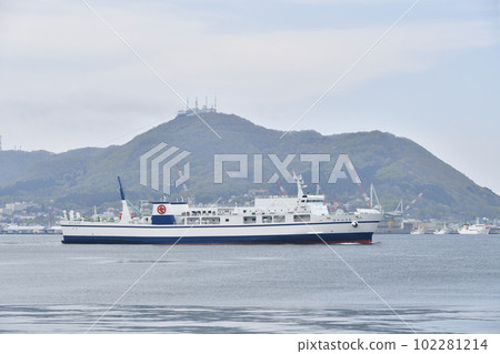 Shooting scenery of Tsugaru Kaikyo Ferry departing from Hakodate Port in Hakodate City, Hokkaido in spring 102281214